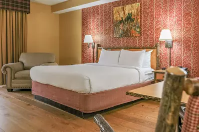 bed in a hotel room at bearskin lodge in gatlinburg