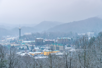 view of downtown Gatlinburg in winter covered in snow